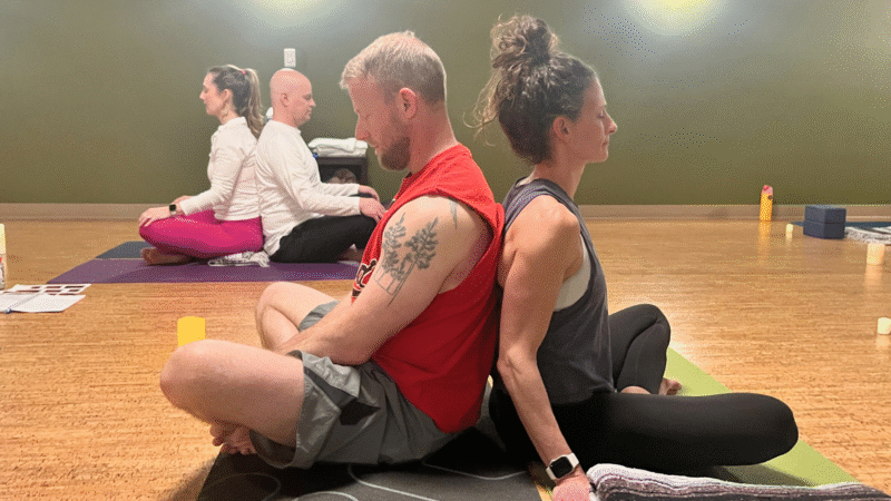 Couple doing yoga at Raintree Athletic Club